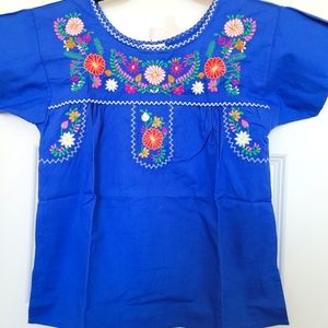 Girls embroidered shirt.